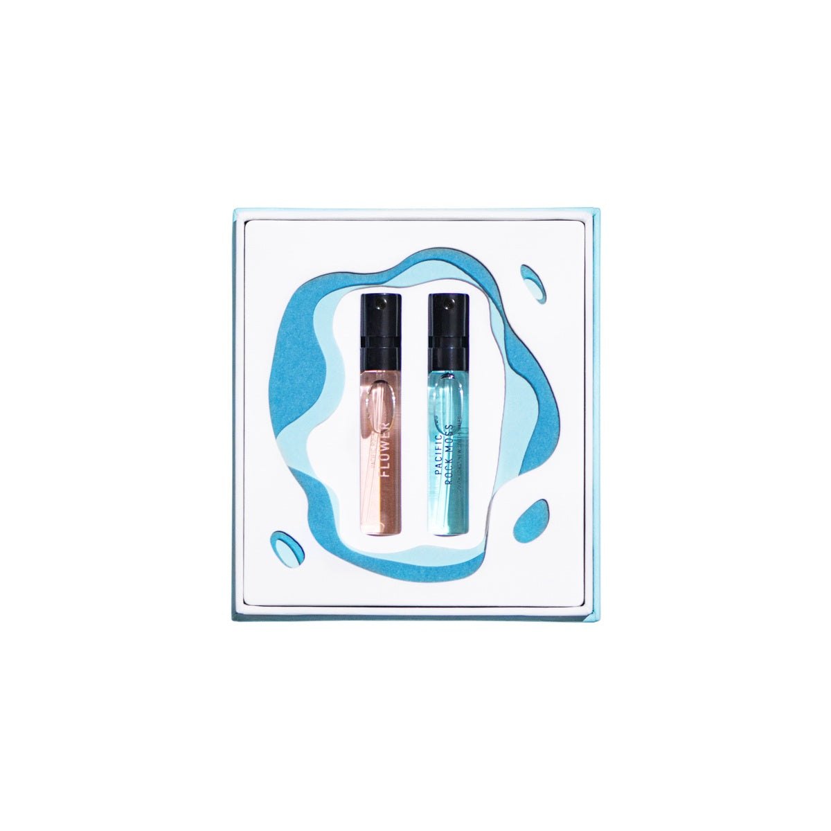 Pacific Duo Coffret with two 2ml Eau de Parfum sprays of Pacific Rock Flower and Pacific Rock Moss in a coastal-inspired gift box