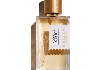 Ingenious Ginger perfume bottle with wooden cap and clear glass design