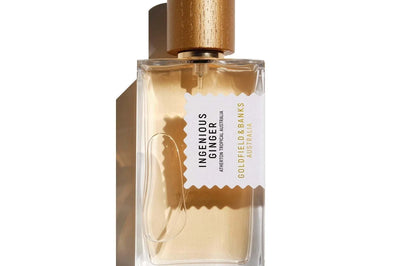 Ingenious Ginger perfume bottle with wooden cap and clear glass design