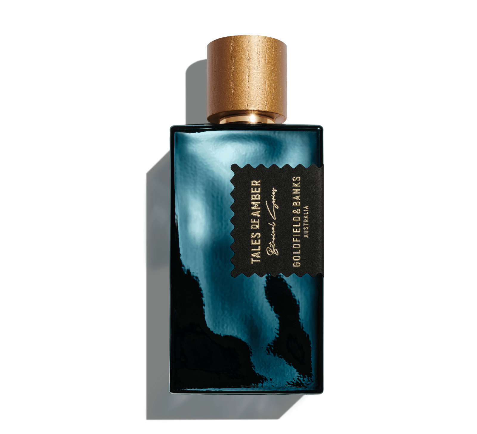 Tales of Amber perfume bottle with black and gold design and wooden cap