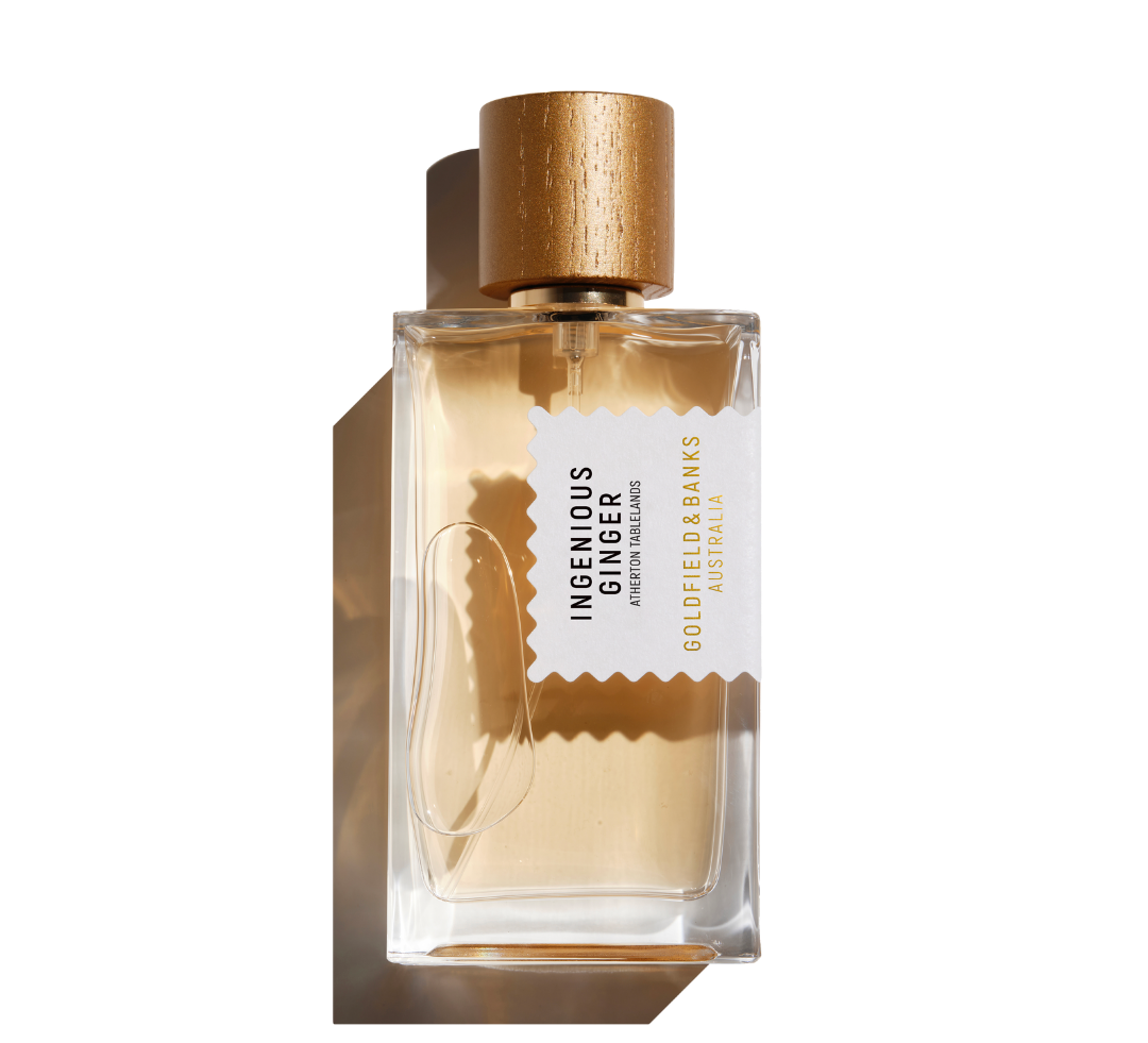 Ingenious Ginger perfume bottle with wooden cap and clear glass design